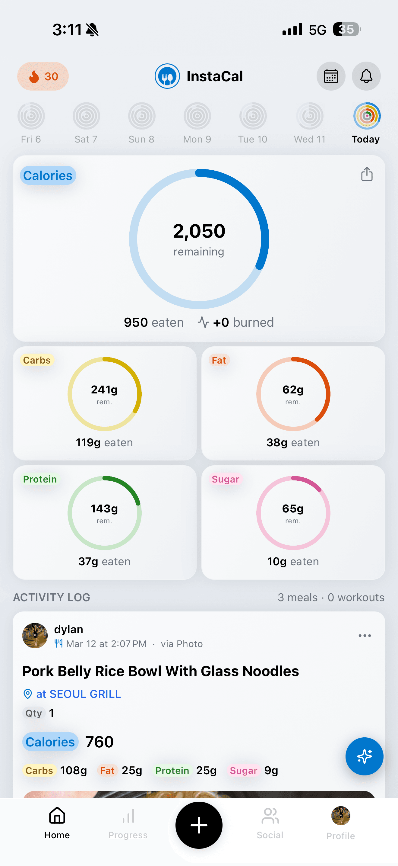 InstaCal home dashboard showing daily calorie tracking with macro breakdown rings